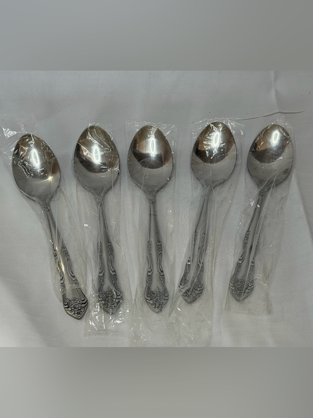 Set of 5 “Dream Rose” Roger’s stainless Korea spoons